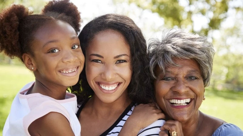 A Child with her mother and grandmother