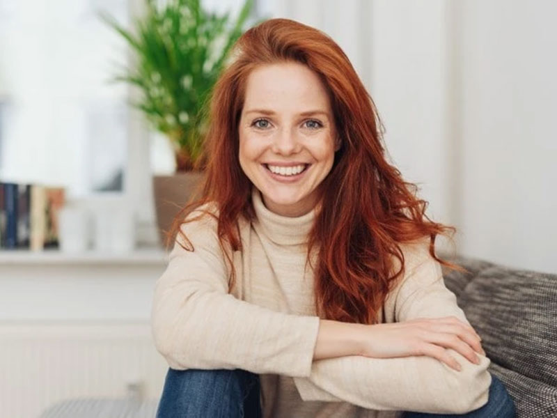 a young woman smiling